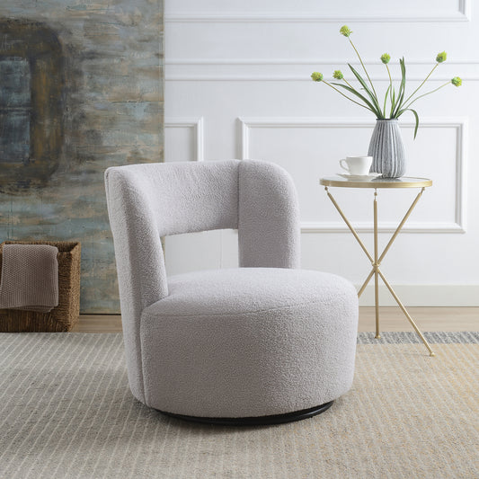 Cozy grey boucl swivel armchair with a modern rounded design perfect for living rooms