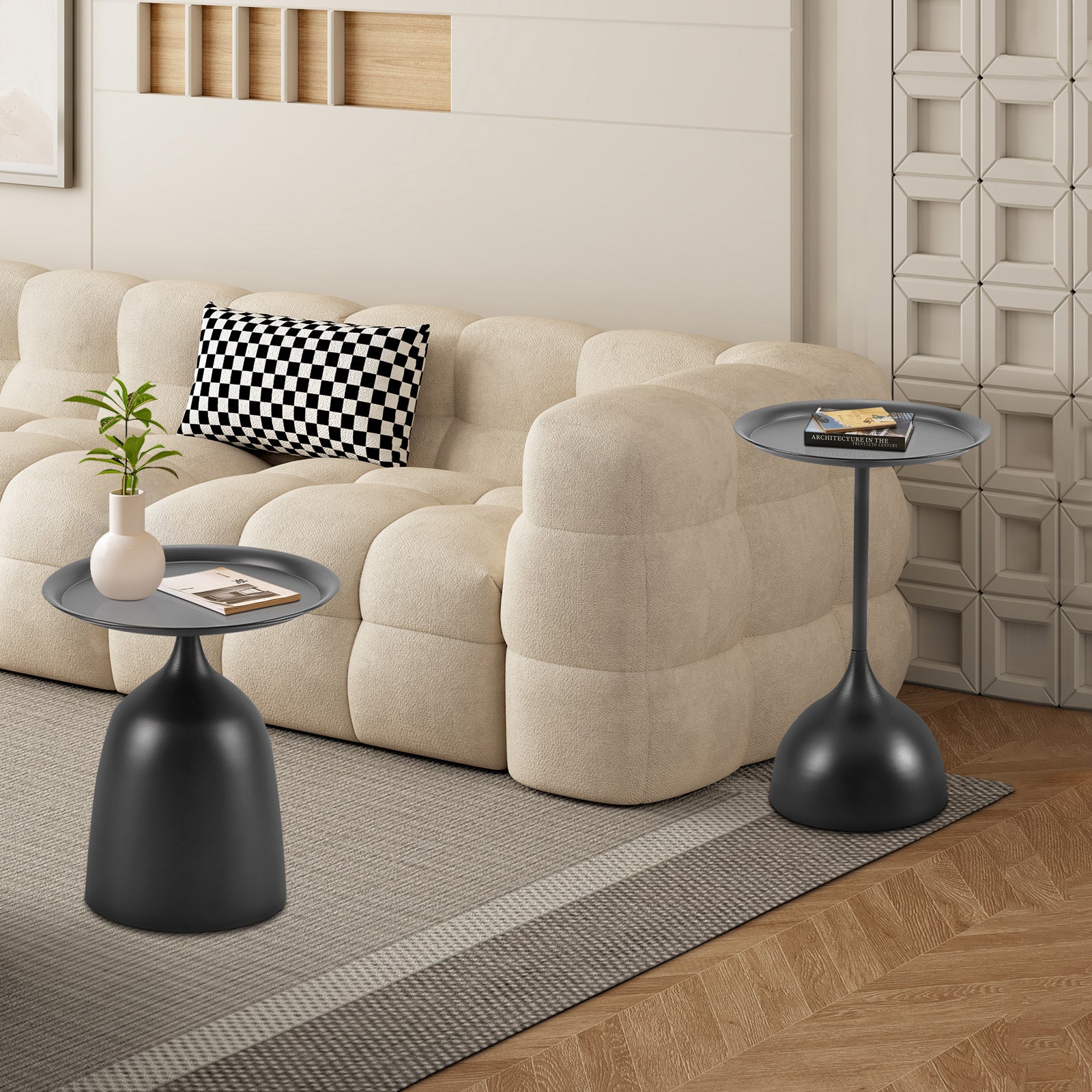 Black modern side table with a rounded base and tray top perfect for living rooms