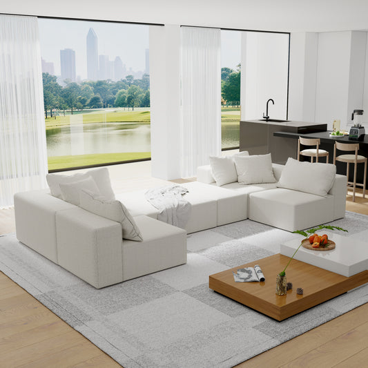 Plush white sectional sofa with throw blanket modern living room centerpiece