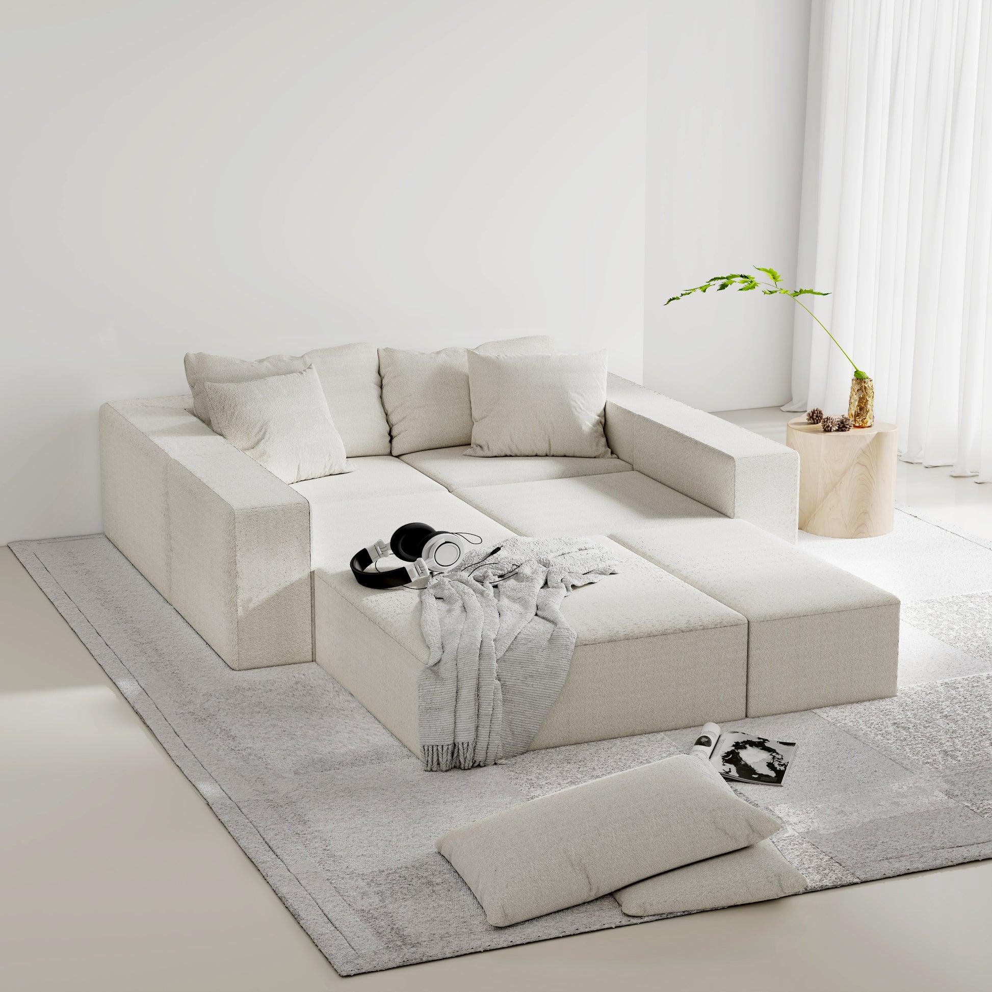 Plush cream sectional sofa with multiple large cushions and a textured finish