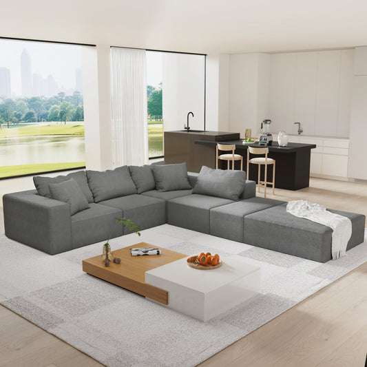 Modular grey fabric sectional sofa with ottoman for living room