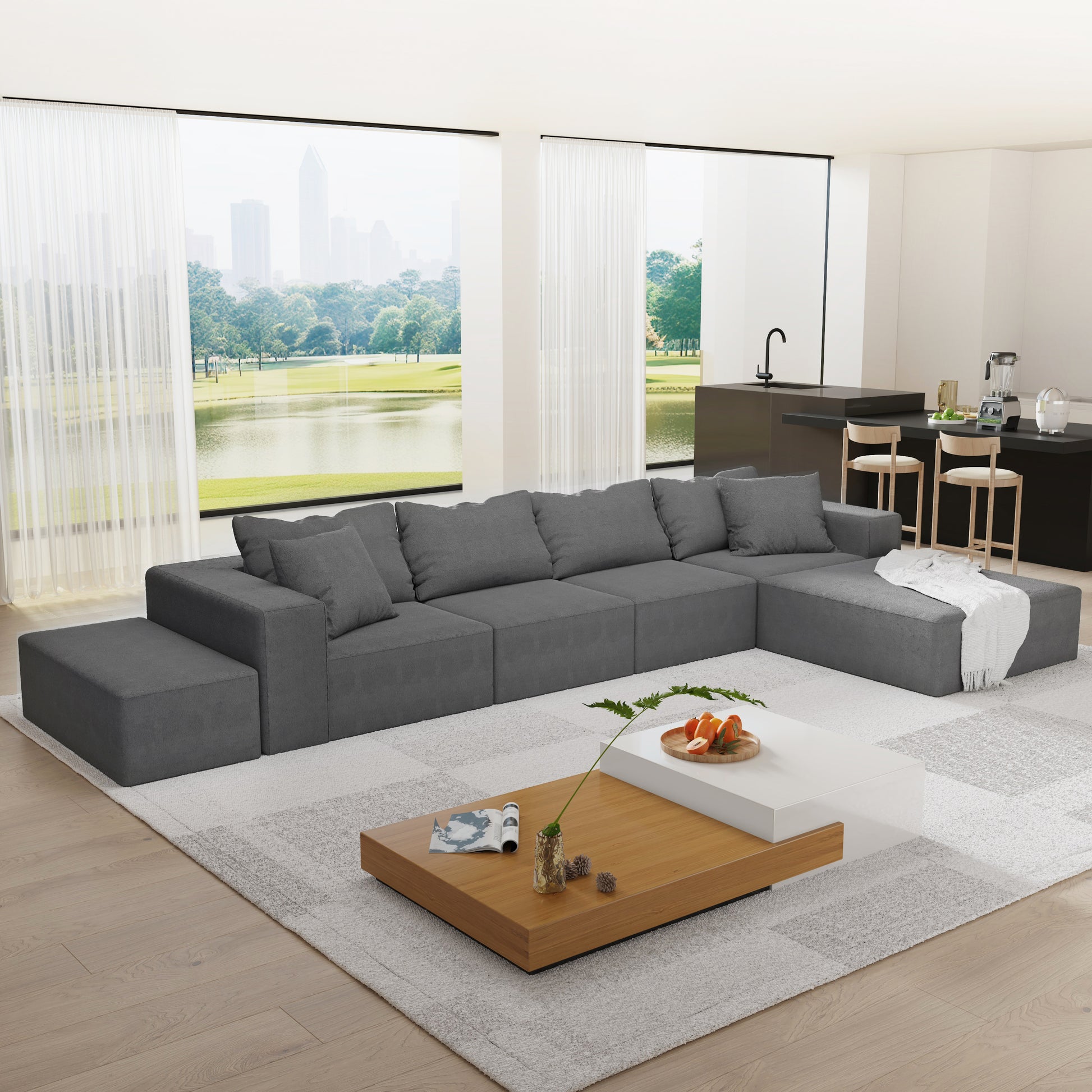 Spacious modular sectional sofa in charcoal gray fabric ideal for modern living rooms