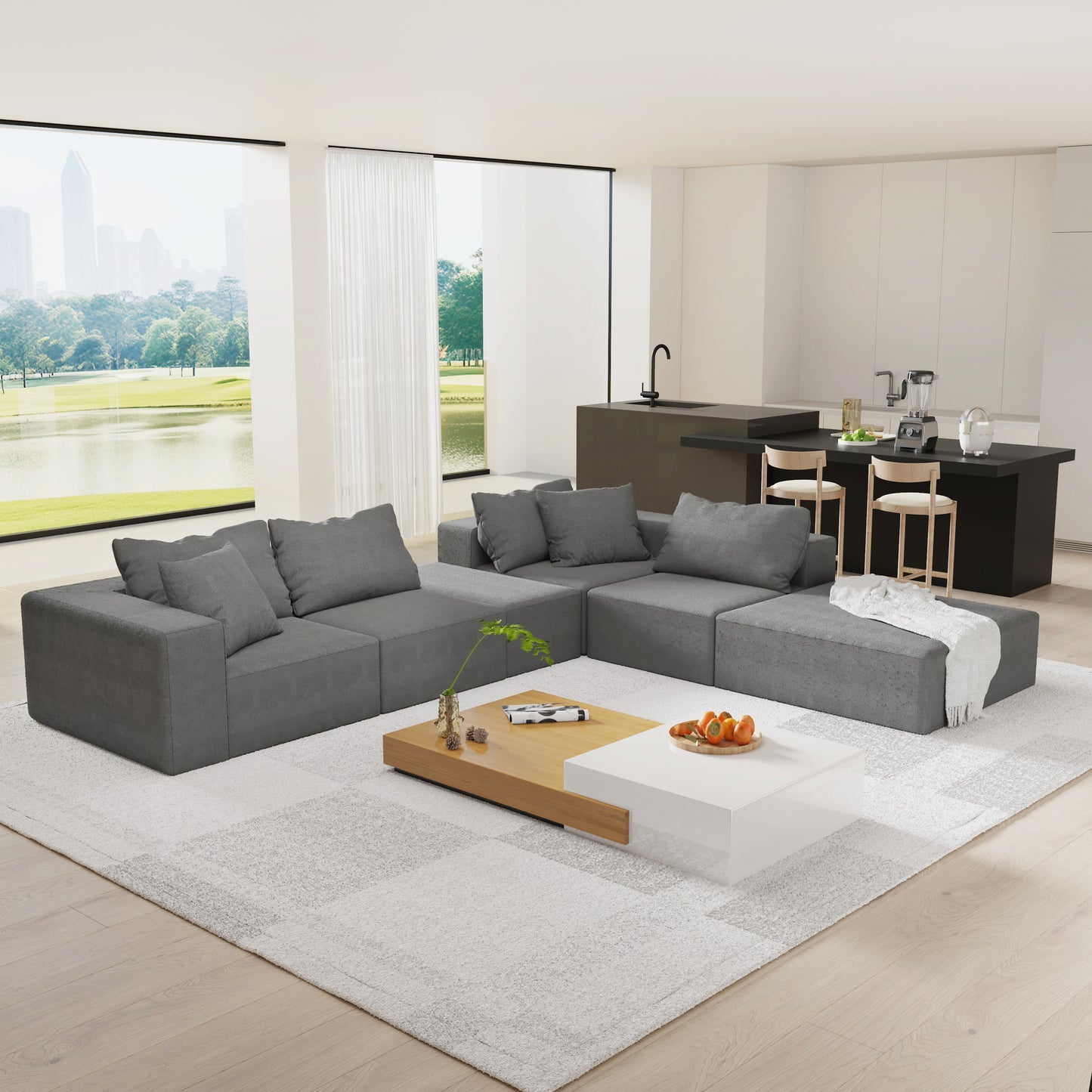 Spacious modular sectional sofa in a deep charcoal gray fabric perfect for modern living rooms