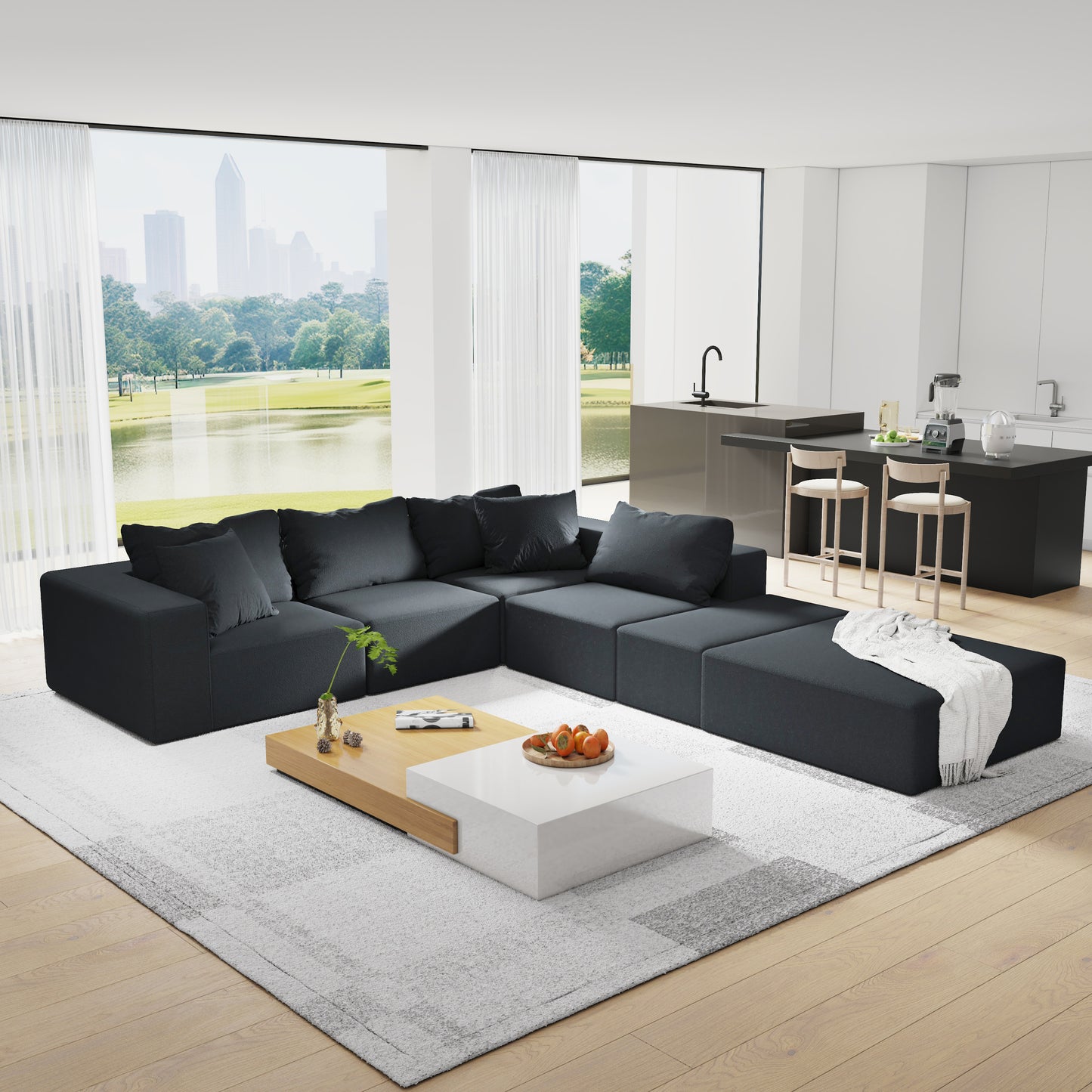 Dark charcoal modular sectional sofa with plush cushions and integrated ottoman perfect for living rooms