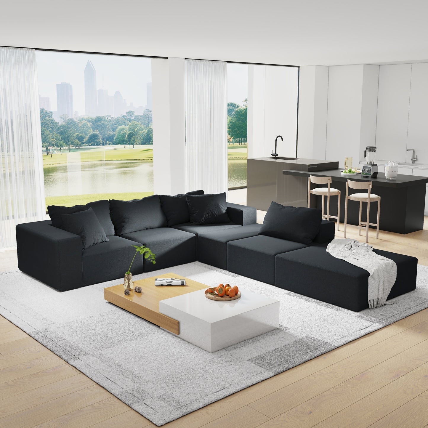 Dark gray sectional sofa with chaise lounge on a light rug