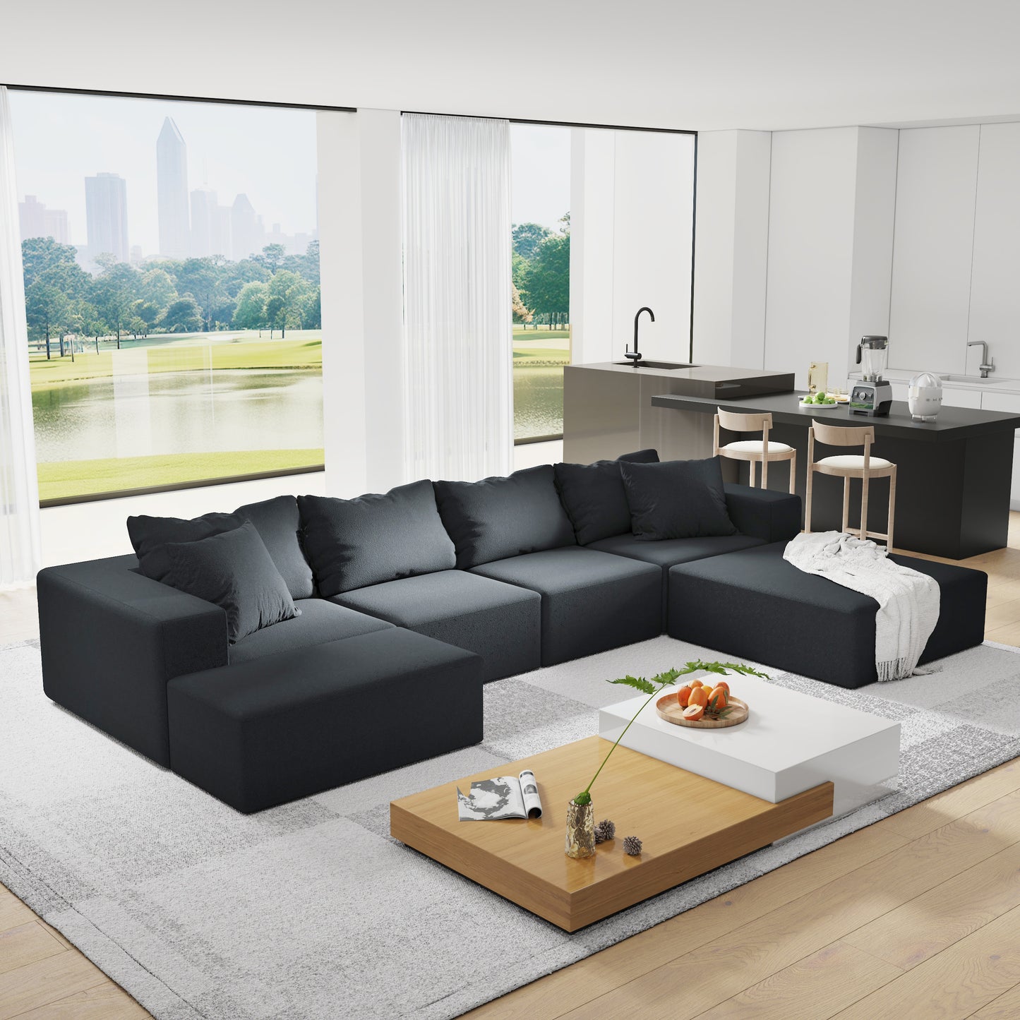 Deep charcoal sectional sofa with plush cushions and a modern ushaped design
