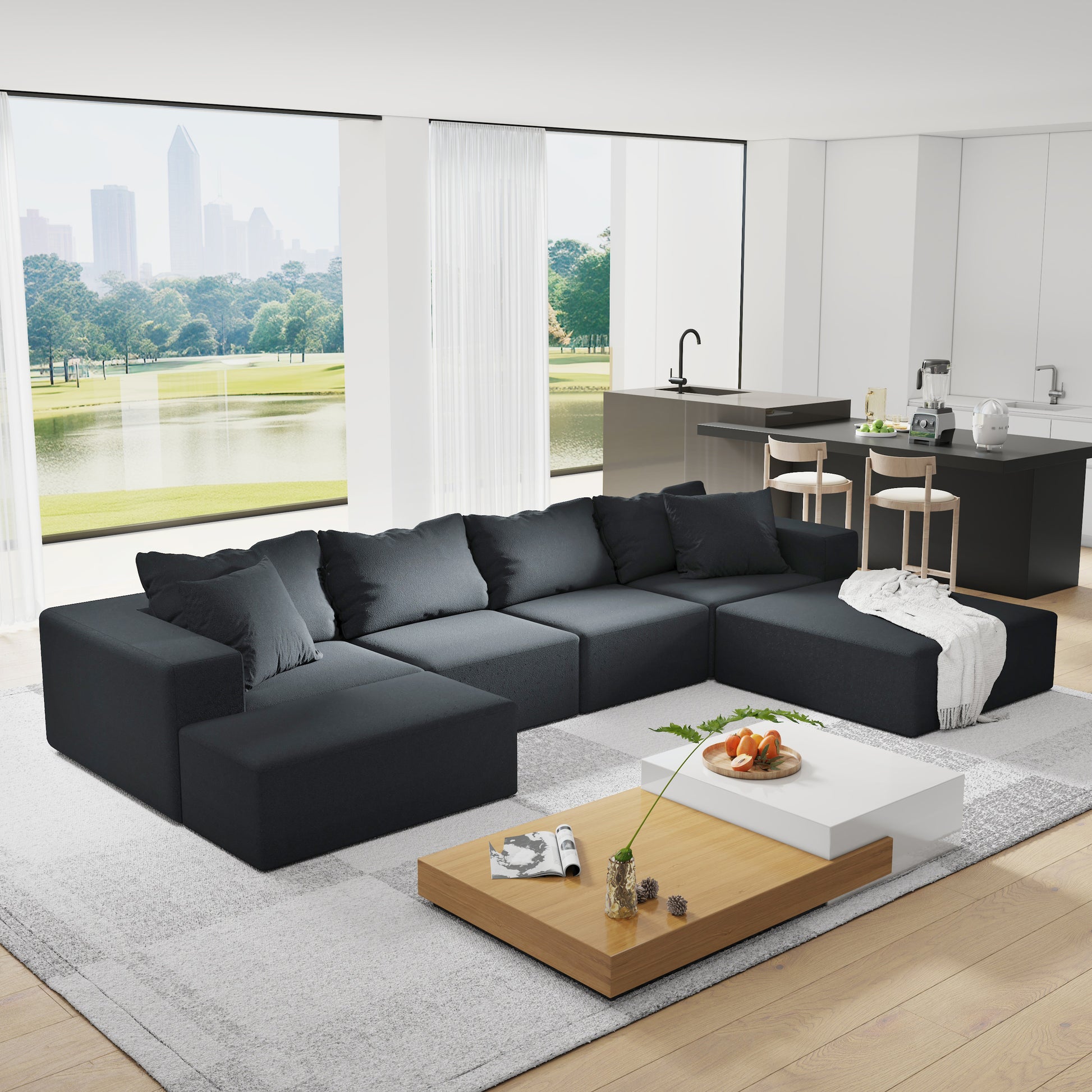 Deep charcoal sectional sofa with plush cushions and a modern ushaped design