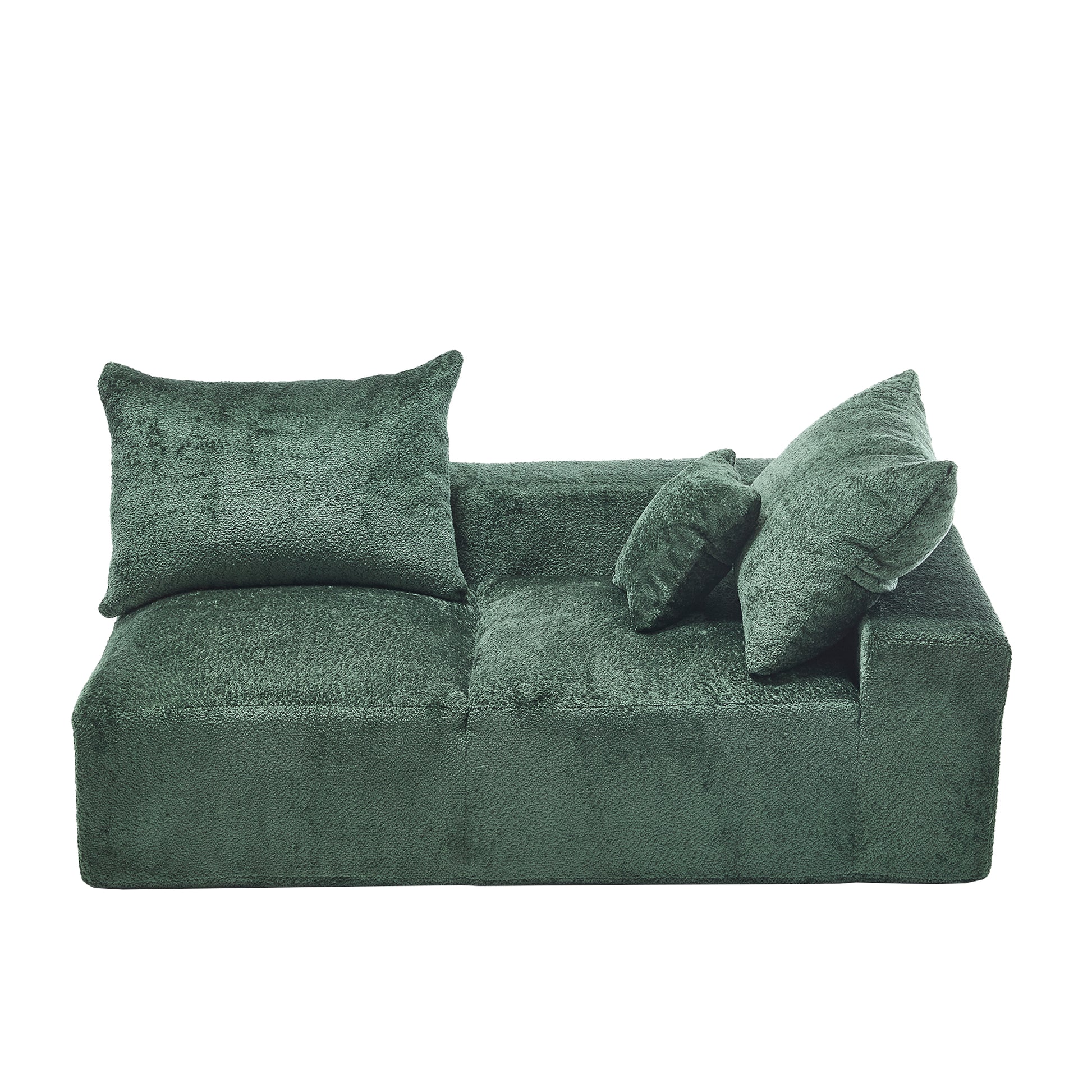 Plush dark green velvet sofa with two large and two small accent pillows modern living room furniture