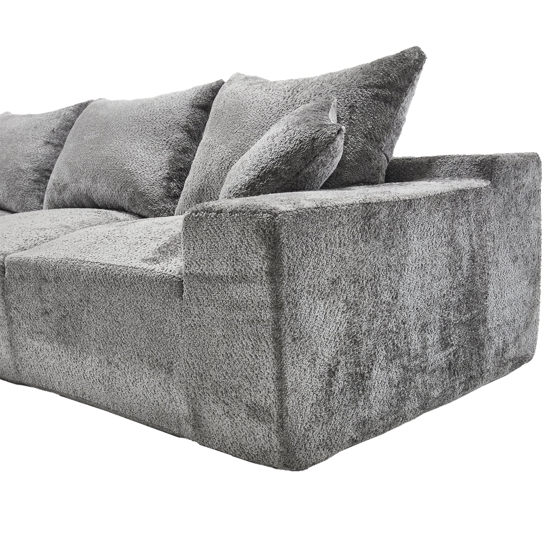 Plush gray sectional sofa with deep cushions perfect for modern living rooms