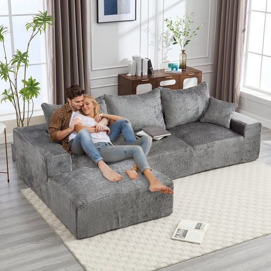 Cozy grey sectional sofa with plush textured fabric perfect for living room relaxation