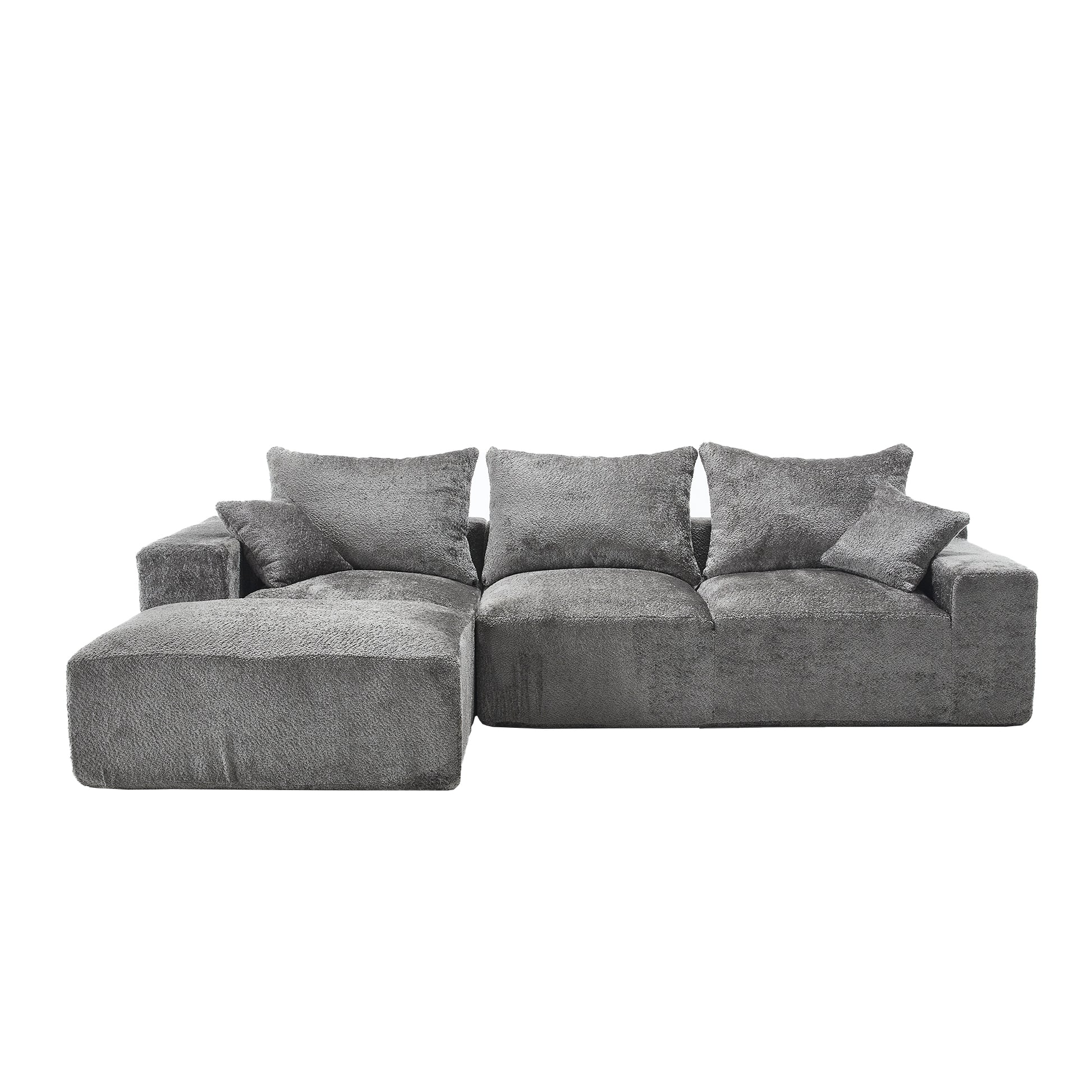 Plush grey sectional sofa with chaise lounge and multiple throw pillows for ultimate comfort