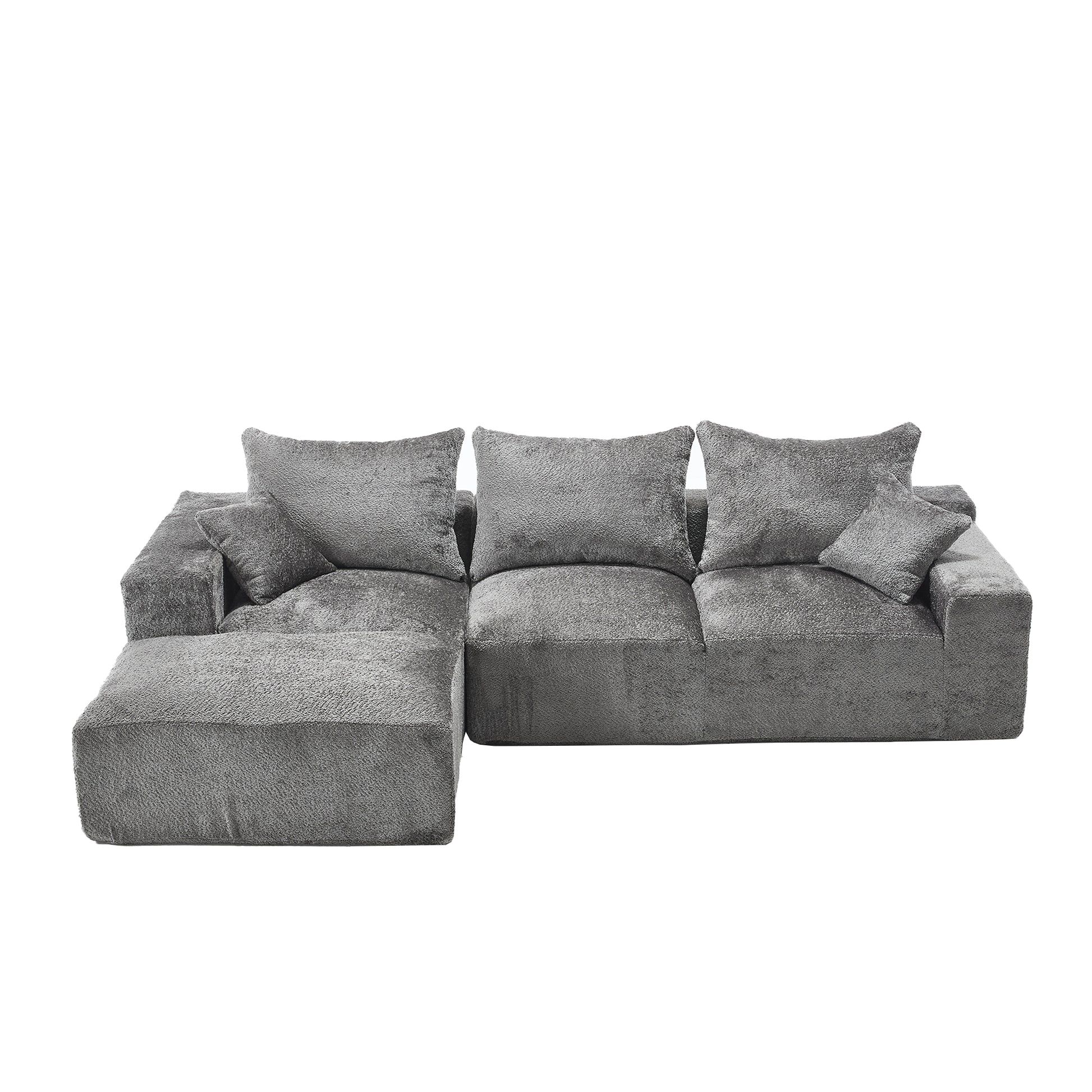 Plush grey sectional sofa with textured fabric and matching throw pillows for modern living room comfort