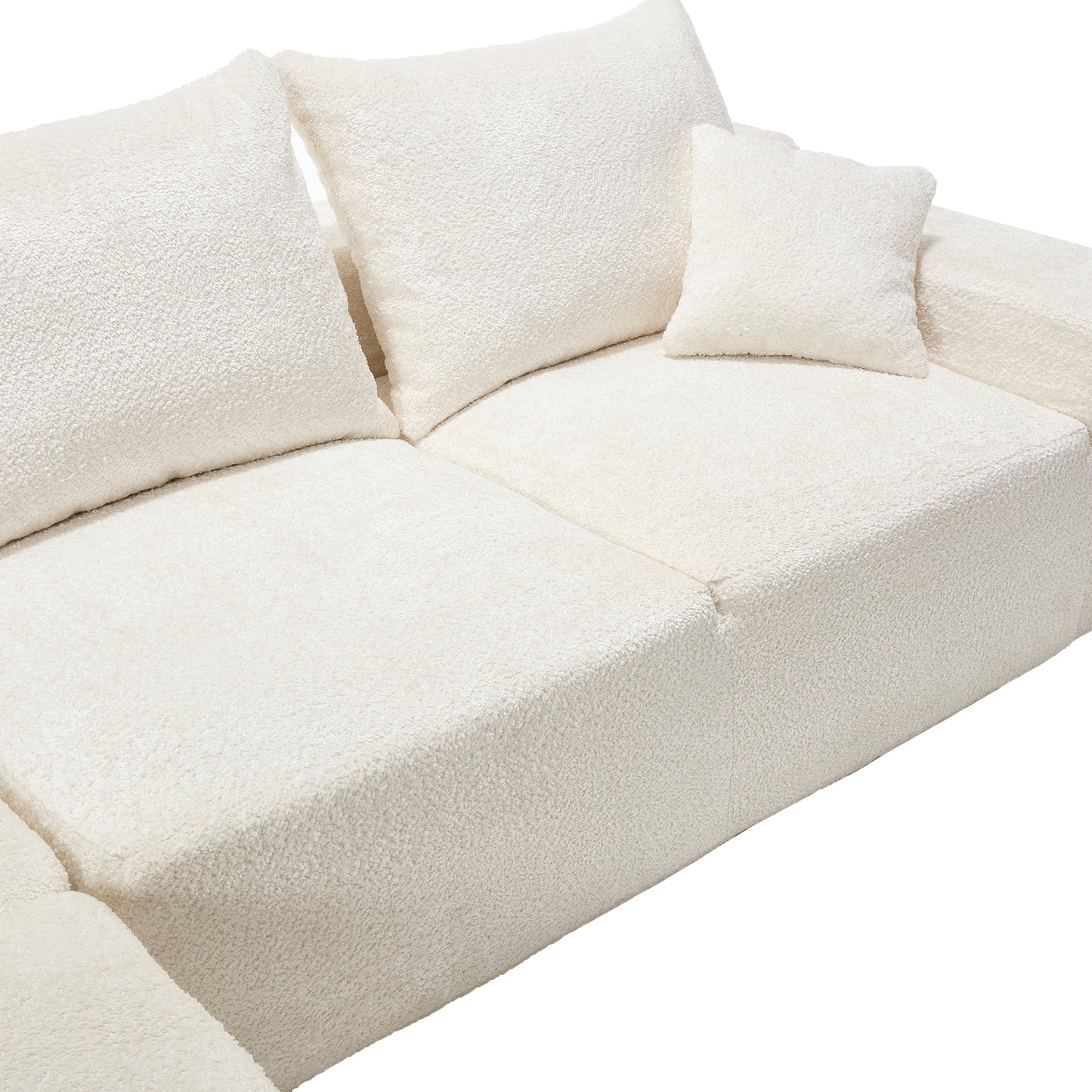 Plush cream boucle sectional sofa with deep seating and textured cushions