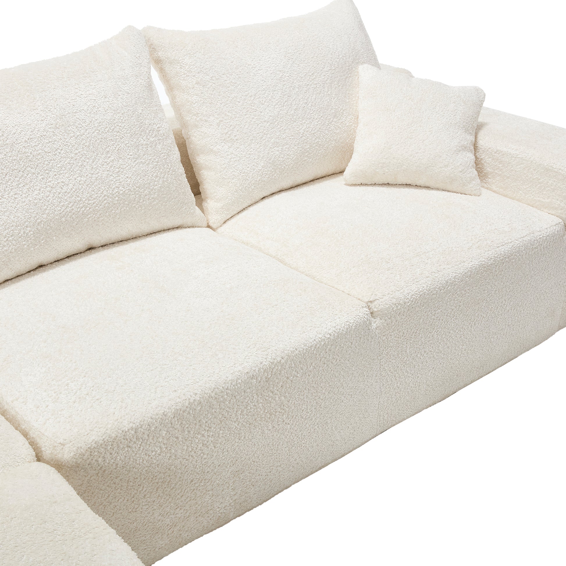 Plush cream boucle sectional sofa with deep seating and textured cushions