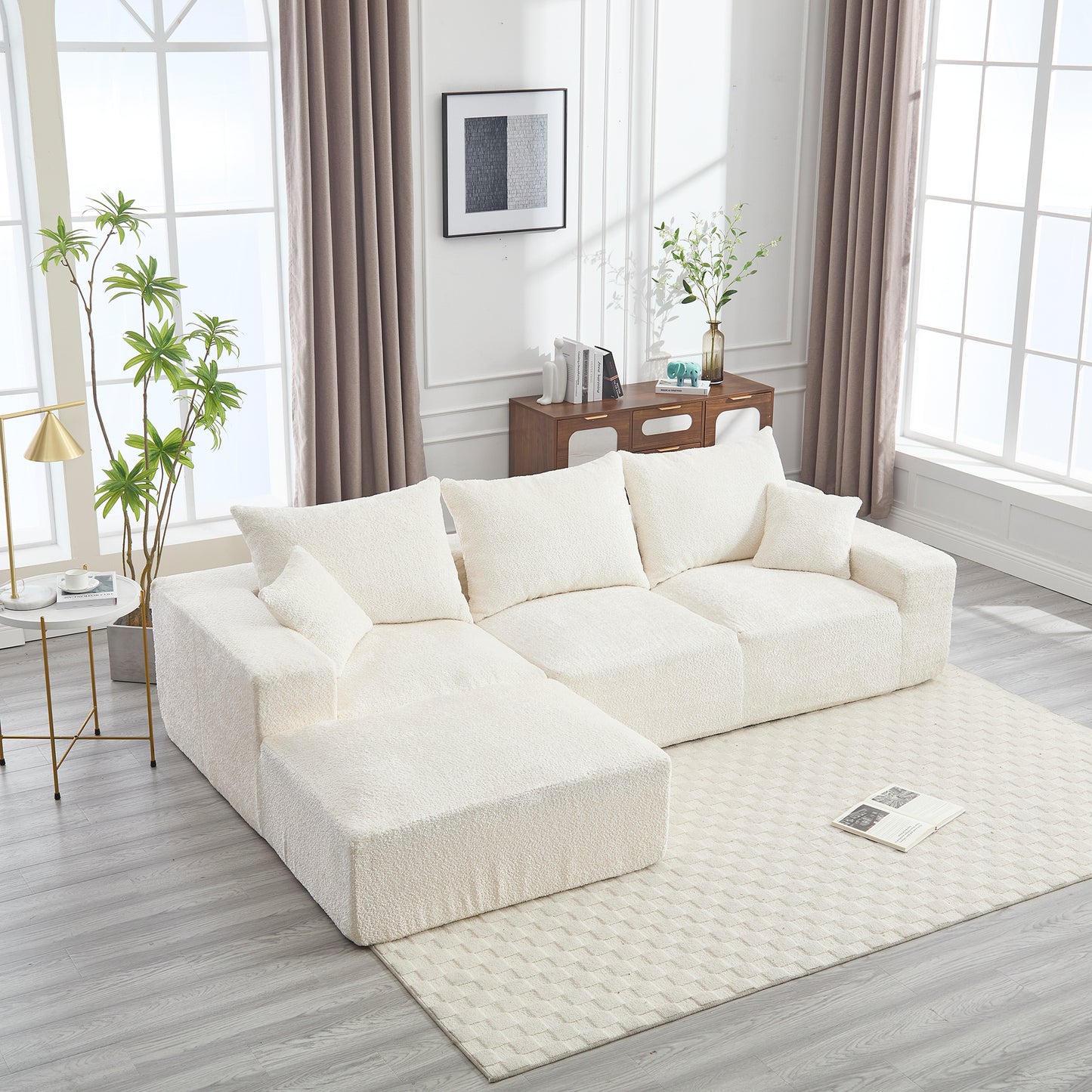 Plush white sectional sofa with textured fabric and square arms in a modern living room setting