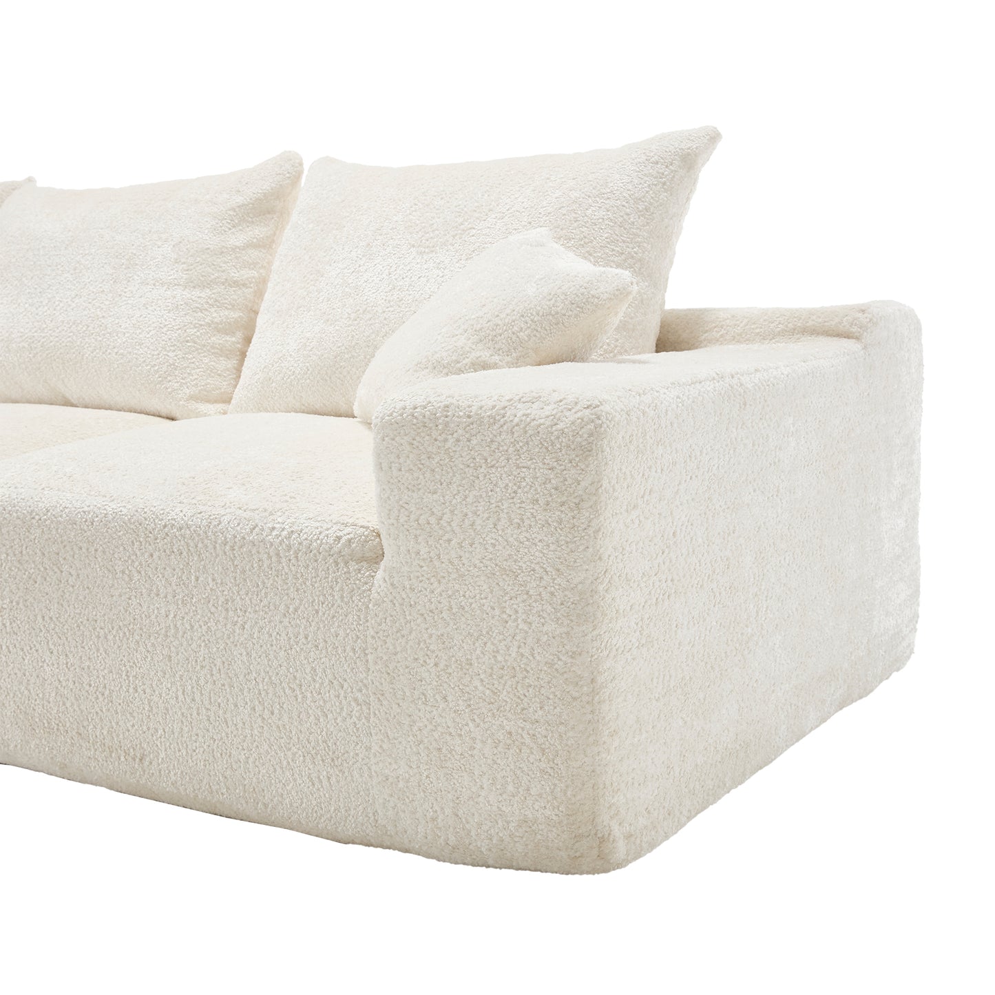 Plush cream boucl sectional sofa with deep inviting cushions for a modern living room