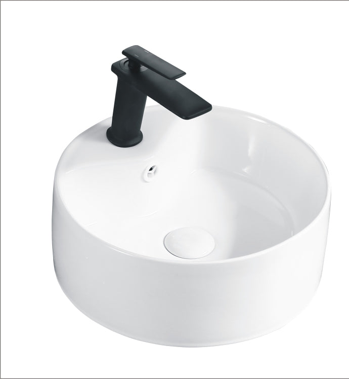 White ceramic vessel sink with a modern matte black faucet and popup drain