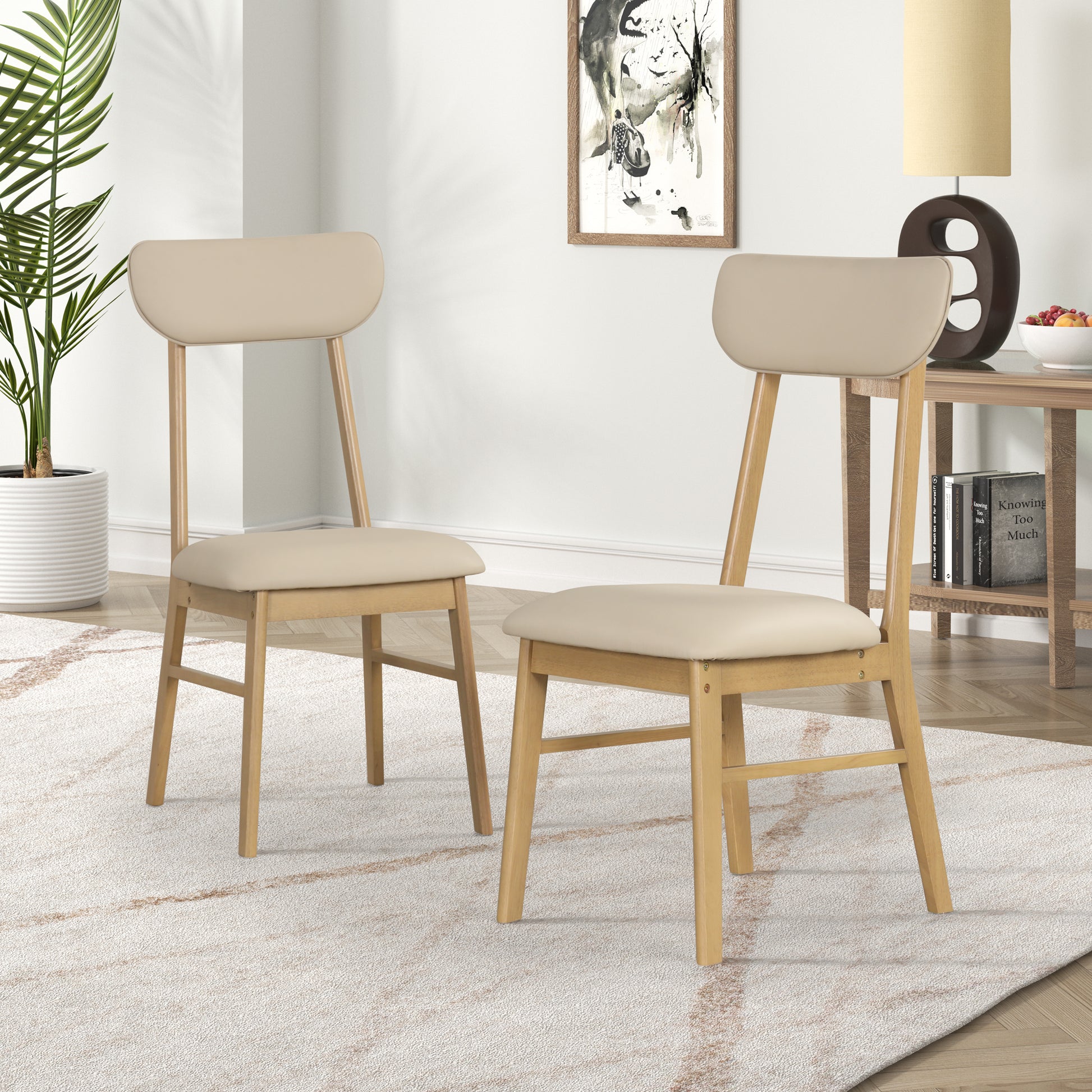 Beige upholstered dining chairs with natural wood frames