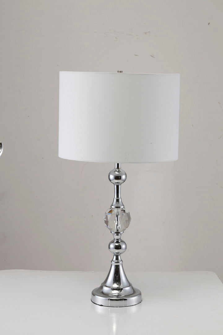 Elegant chrome table lamp with clear crystal accent and white drum shade