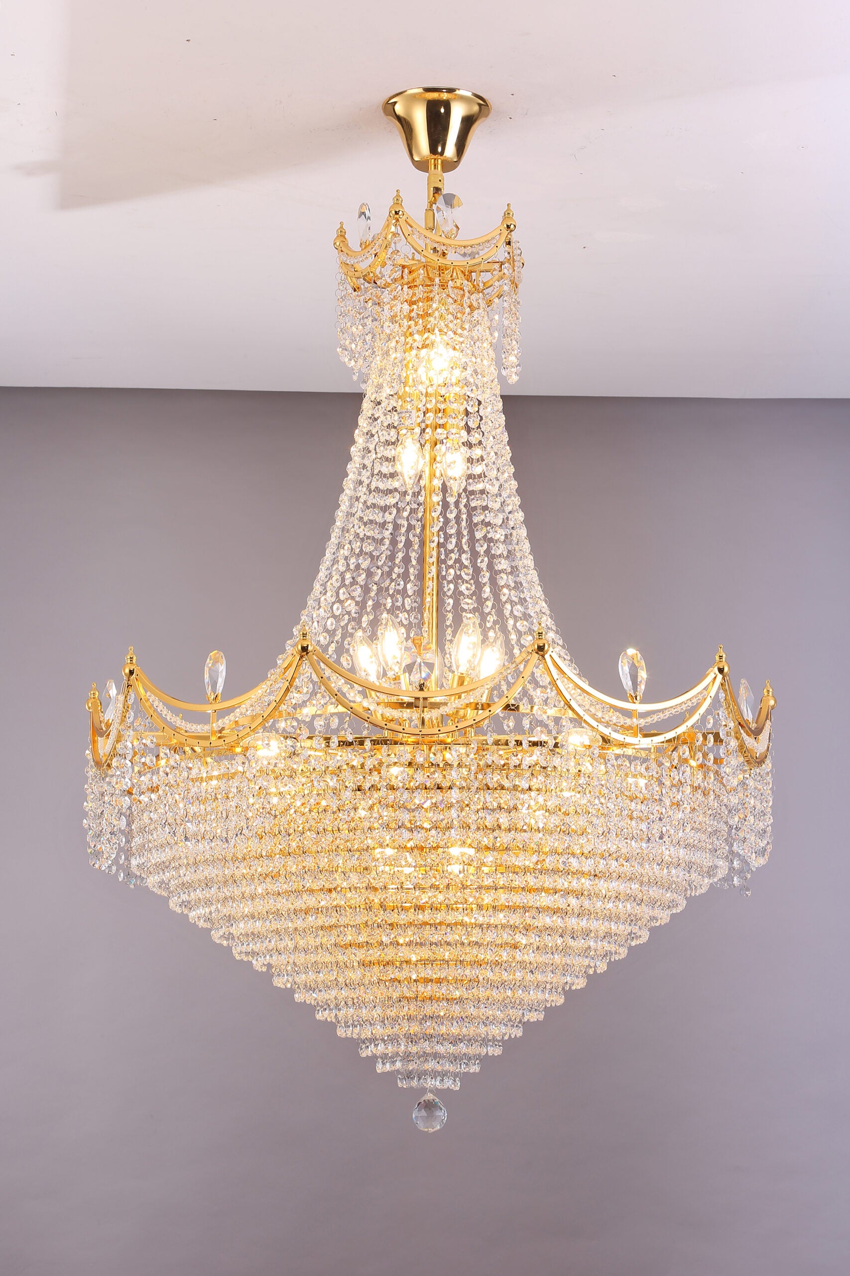 Gold crystal chandelier with cascading strands perfect for elegant dining rooms