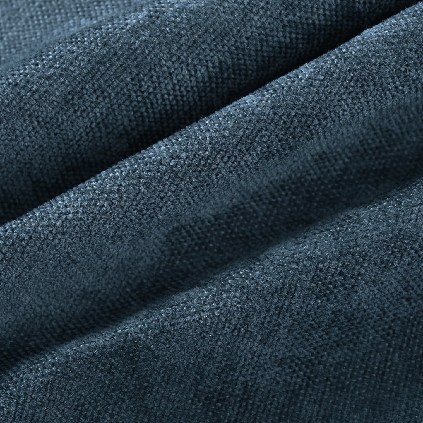 Textured navy blue velvet fabric with soft nap and subtle sheen ideal for upholstery