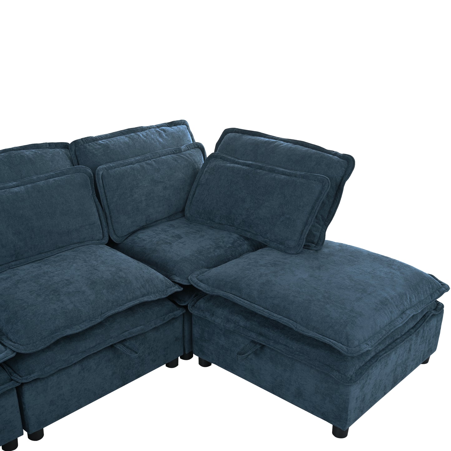 Deep blue velvet modular sectional sofa with plush cushions and storage ottoman