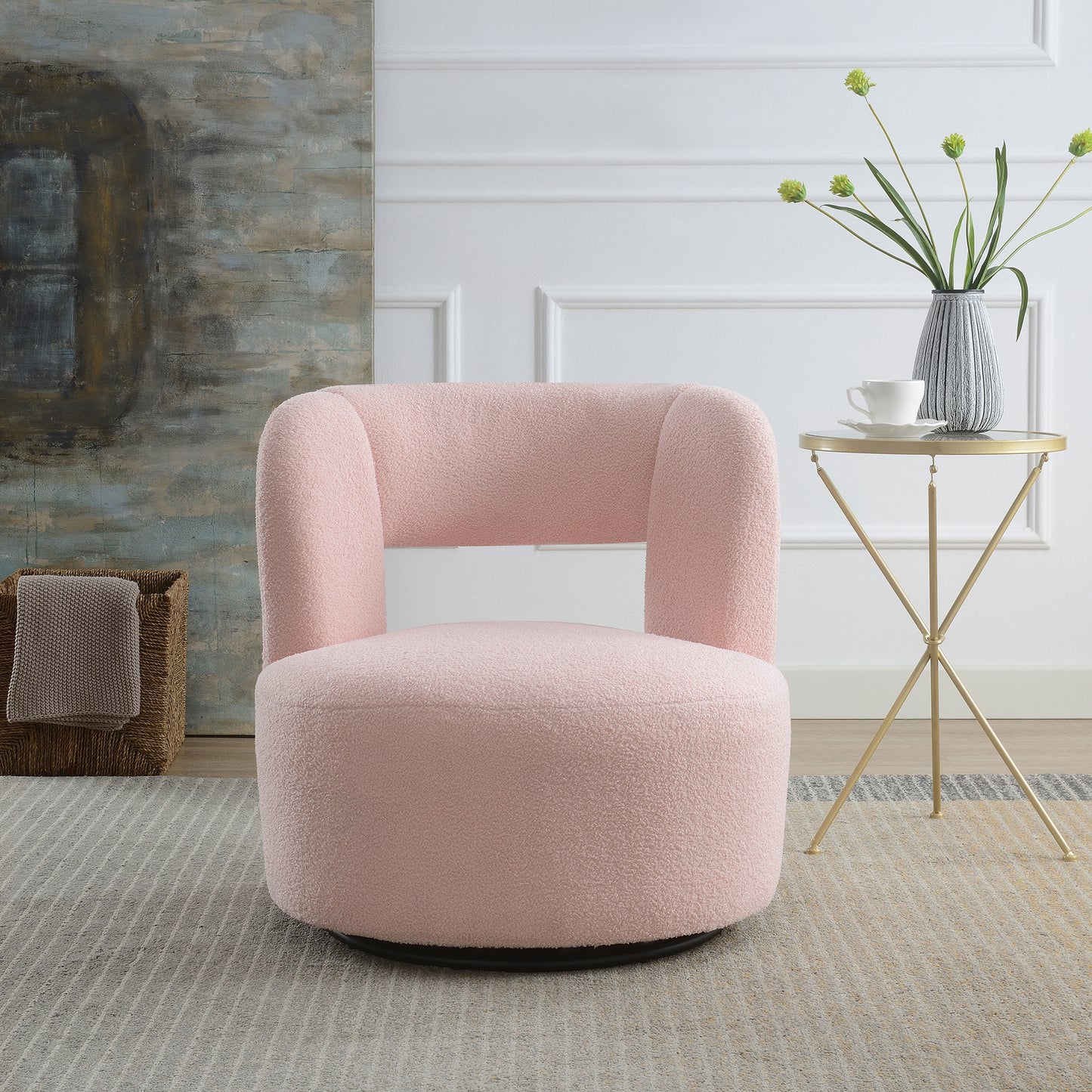 Plush pink boucle accent chair with curved back for a cozy reading nook
