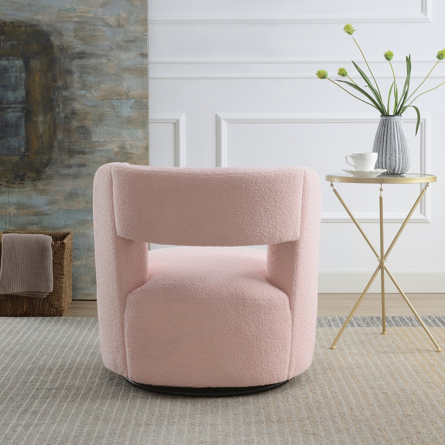 Plush pink swivel accent chair with rounded back and wide seat for comfort