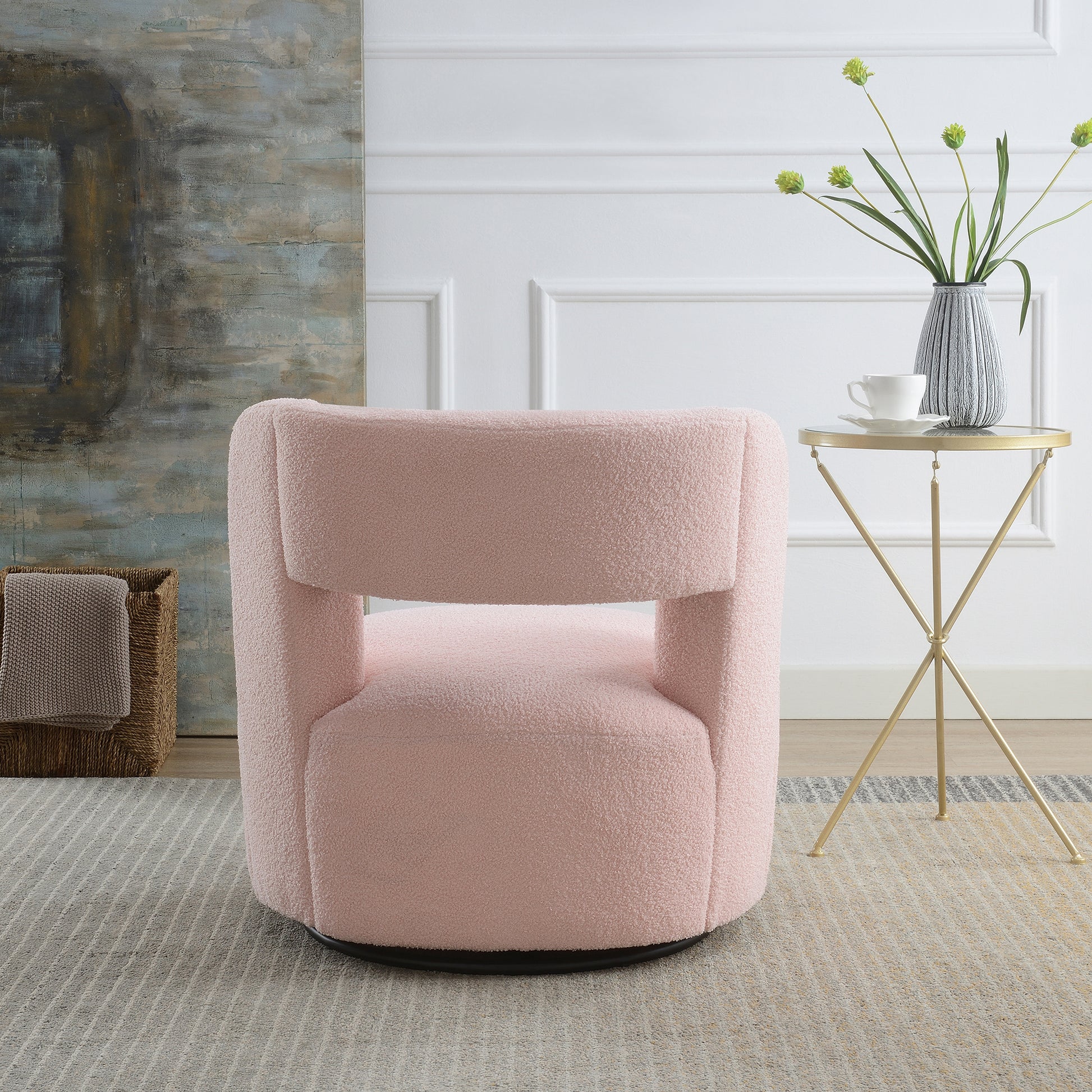 Plush pink swivel accent chair with rounded back and wide seat for comfort