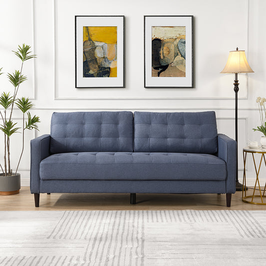 Blue fabric sofa with tufted cushions and wooden legs modern living room seating