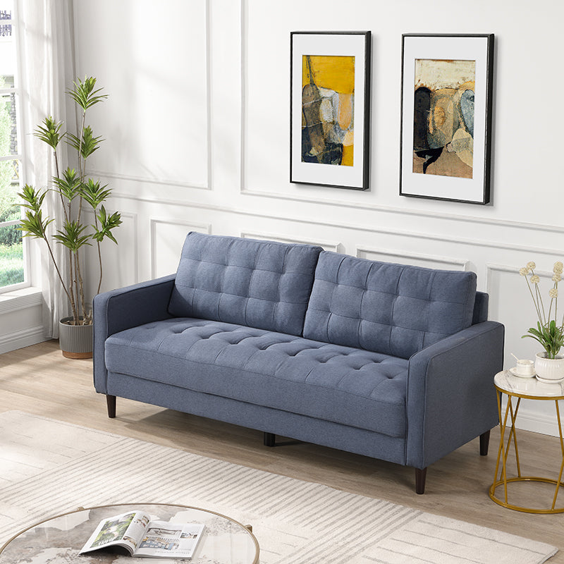 Tufted blue fabric sofa with wooden legs perfect for modern living rooms