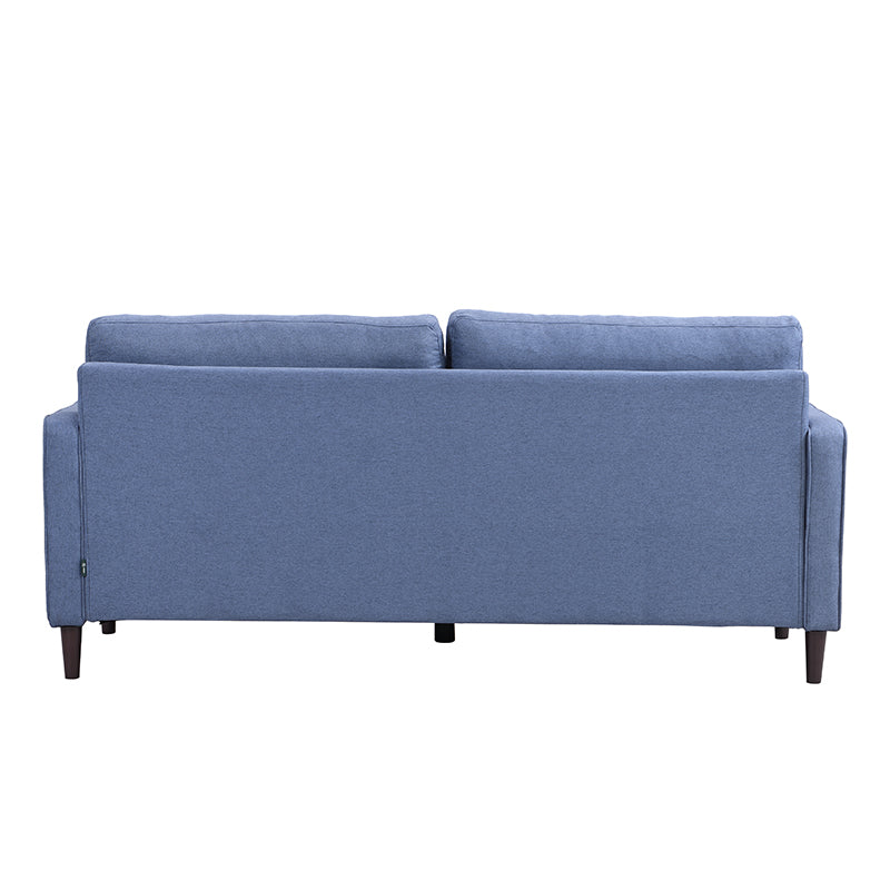 Back view of a blue fabric sofa with comfortable back cushions and tapered wooden legs