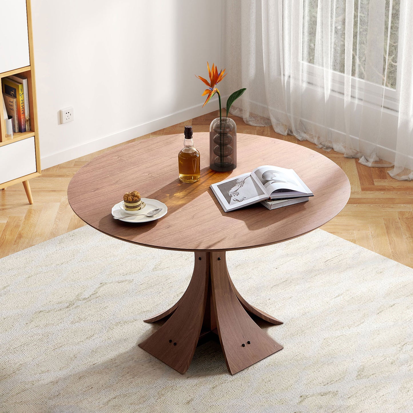 Round wood coffee table with flared wood base showcasing a modern minimalist design