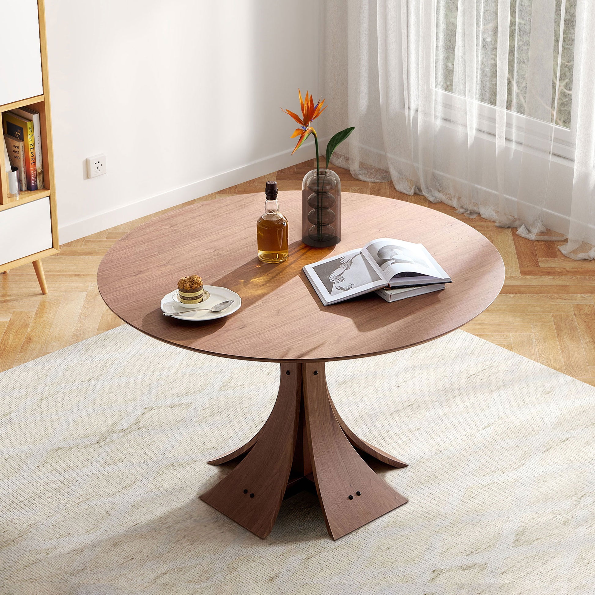 Round wood coffee table with flared wood base showcasing a modern minimalist design