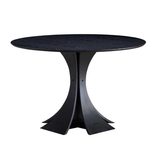 Black round dining table with sculpted wooden base and wood grain texture