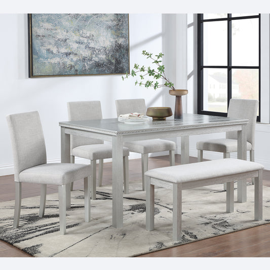 Gray linen upholstered dining chairs with light wood finish legs