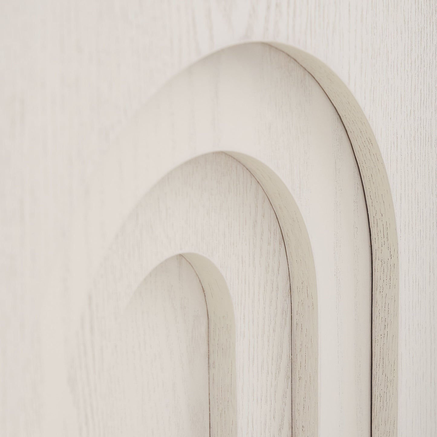 Closeup of layered archway in light wood finish modern design accent