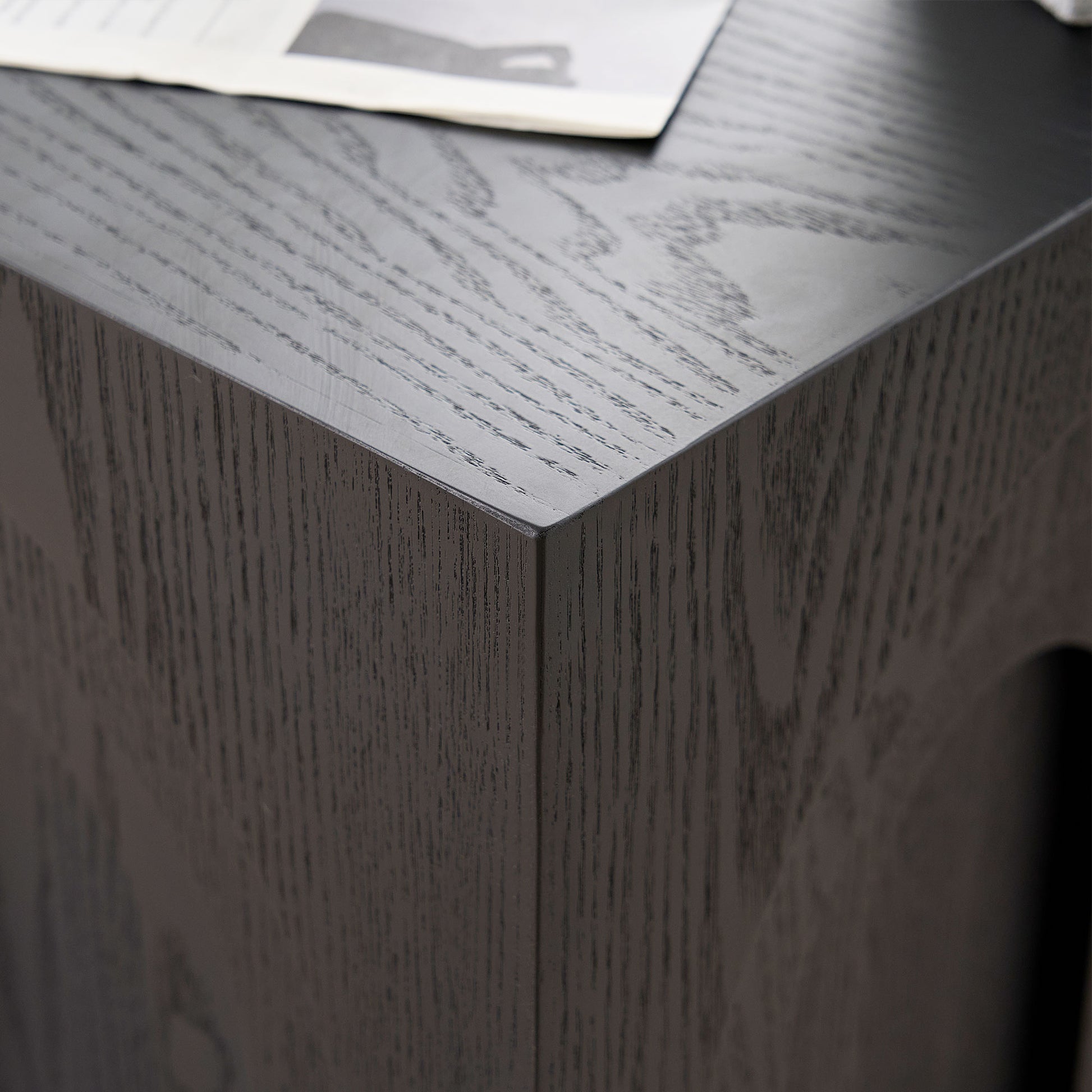 Dark oak wood texture on modern end table corner minimalist design