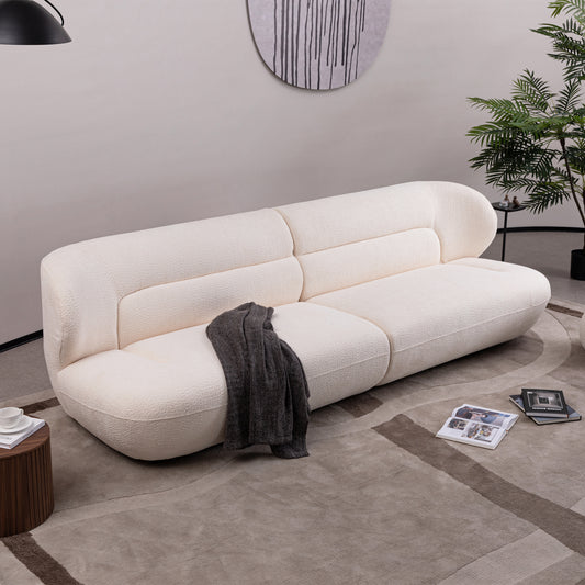 Cream boucle modular sofa with plush texture and rounded silhouette perfect for modern living rooms