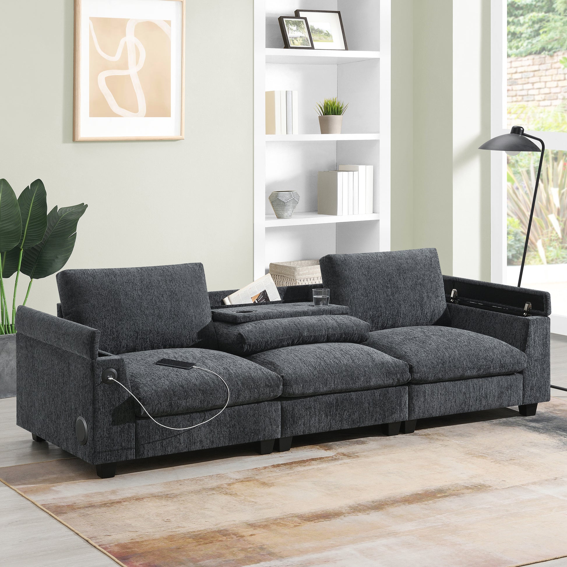 Dark grey fabric sectional sofa with builtin USB charging ports and a hidden storage compartment