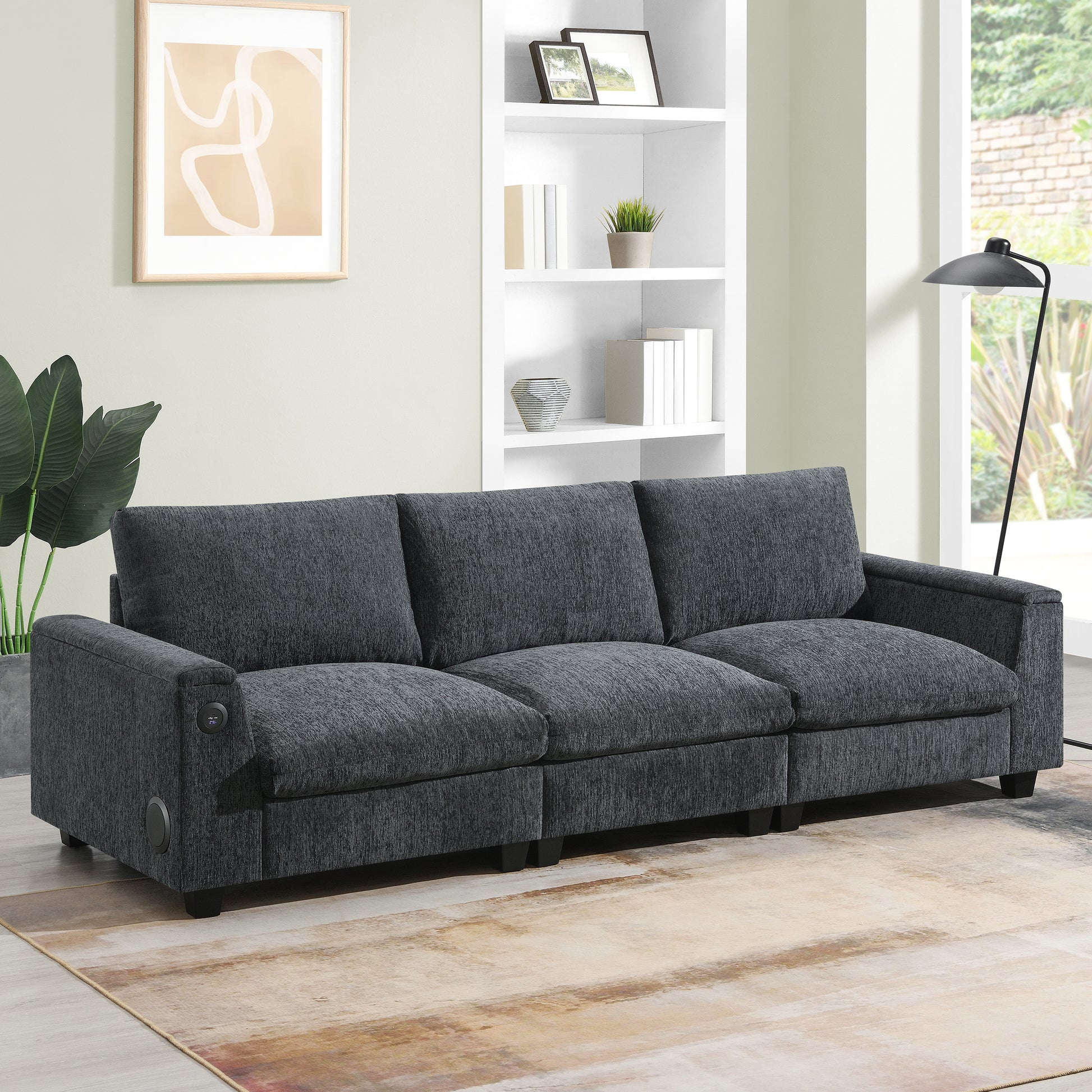 Dark grey fabric sectional sofa with builtin charging ports perfect for modern living rooms