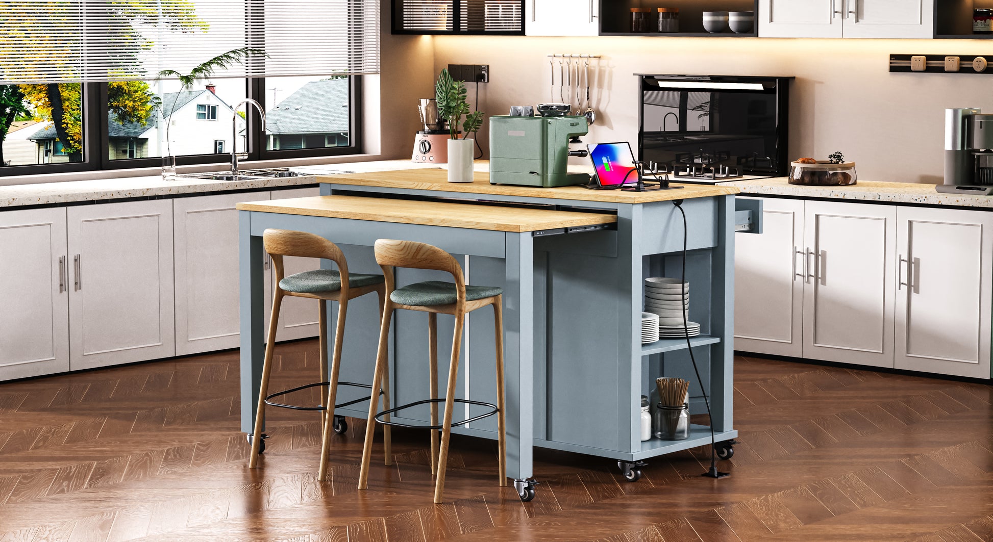 Sage green retro coffee maker with chrome accents on a wooden kitchen island