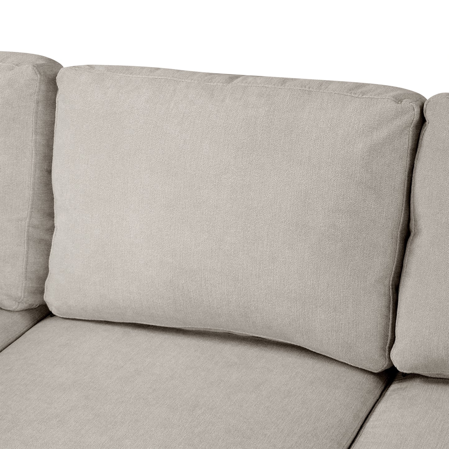 Closeup of a plush light gray linen sofa cushion with detailed stitching