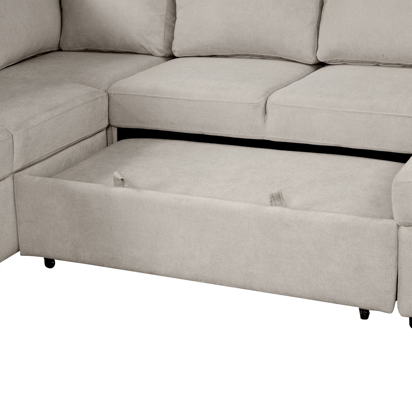 Light grey sectional sofa with pullout storage drawer extended for linens