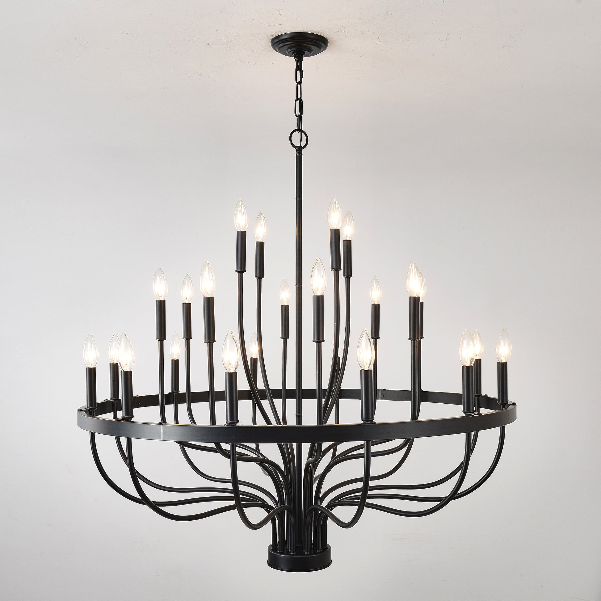 Black light candelabra style chandelier with wrought iron arms
