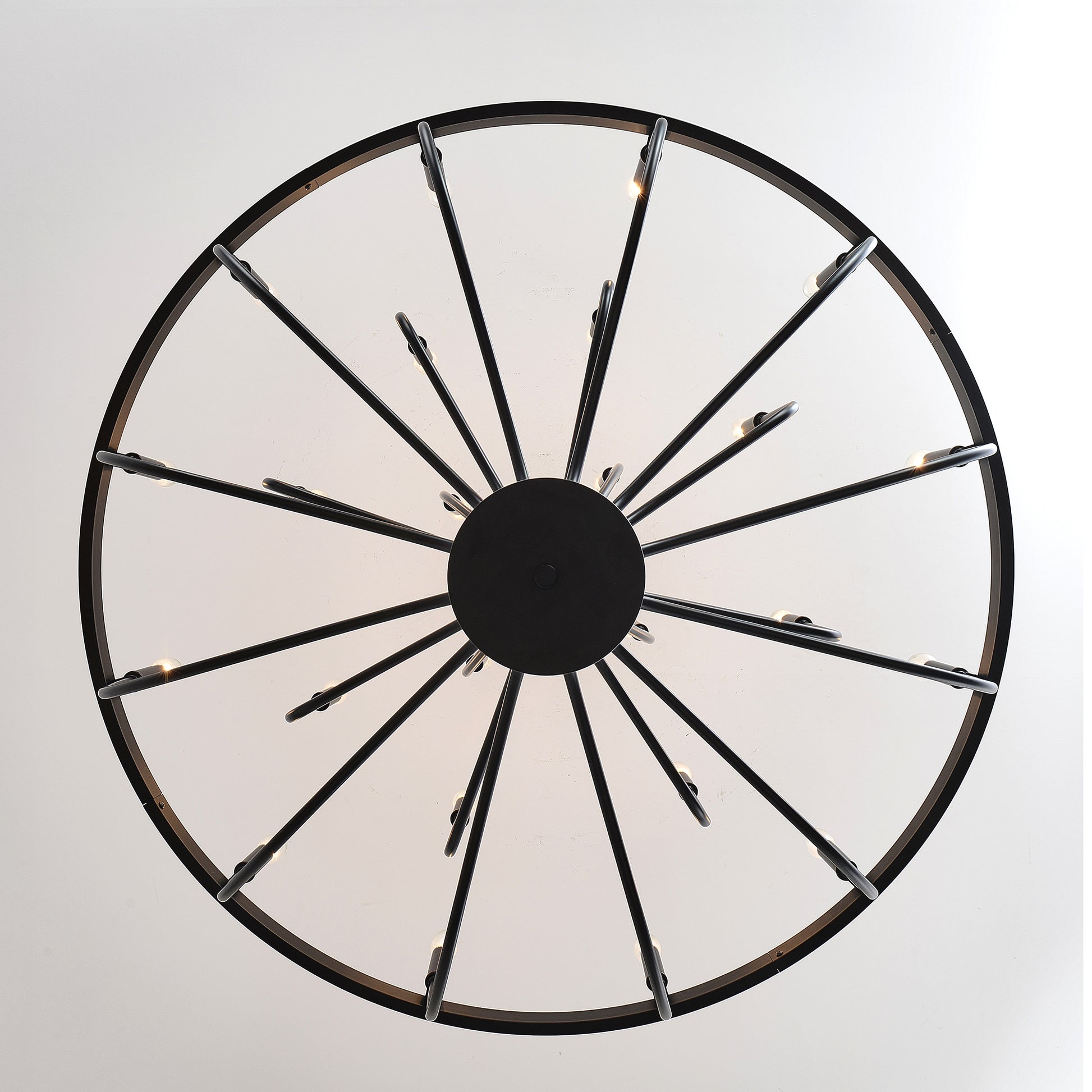 Modern black Sputnik chandelier with radiating arms and exposed bulbs