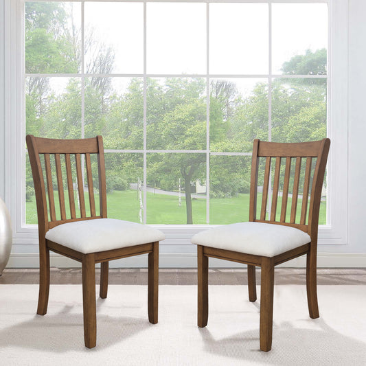 Two wooden dining chairs with slatted backs and white upholstered seats