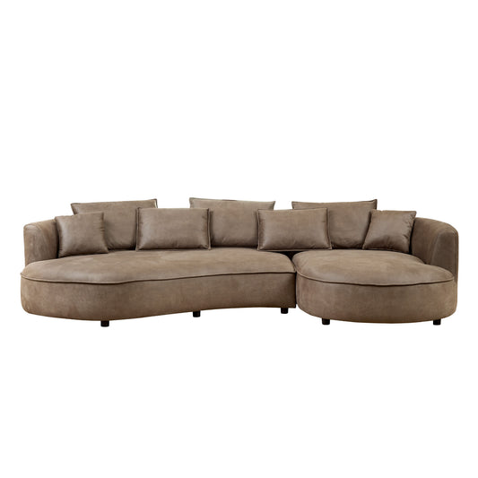 Taupe sectional sofa with plush cushions and curved modern design