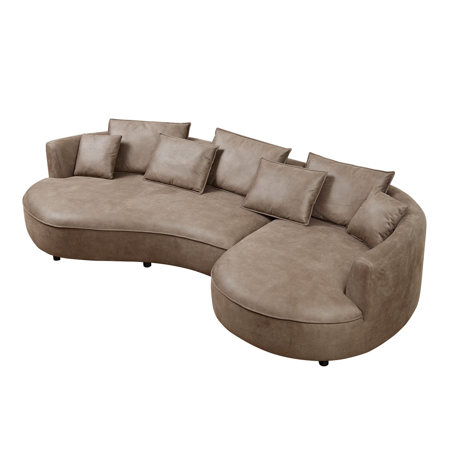 Curved taupe sectional sofa upholstered in soft faux leather with plush accent pillows