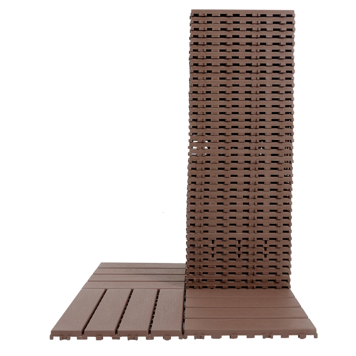 Brown composite deck tiles stacked and laid out suitable for outdoor flooring